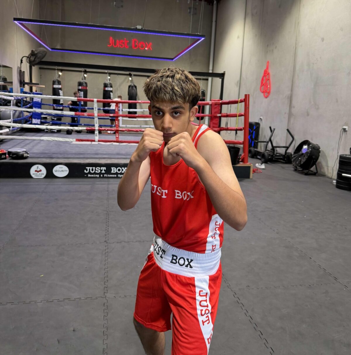 Boxing gym Hindmarsh boxer training in ring at Just Box Adelaide offering beginner boxing classes and fitness boxing