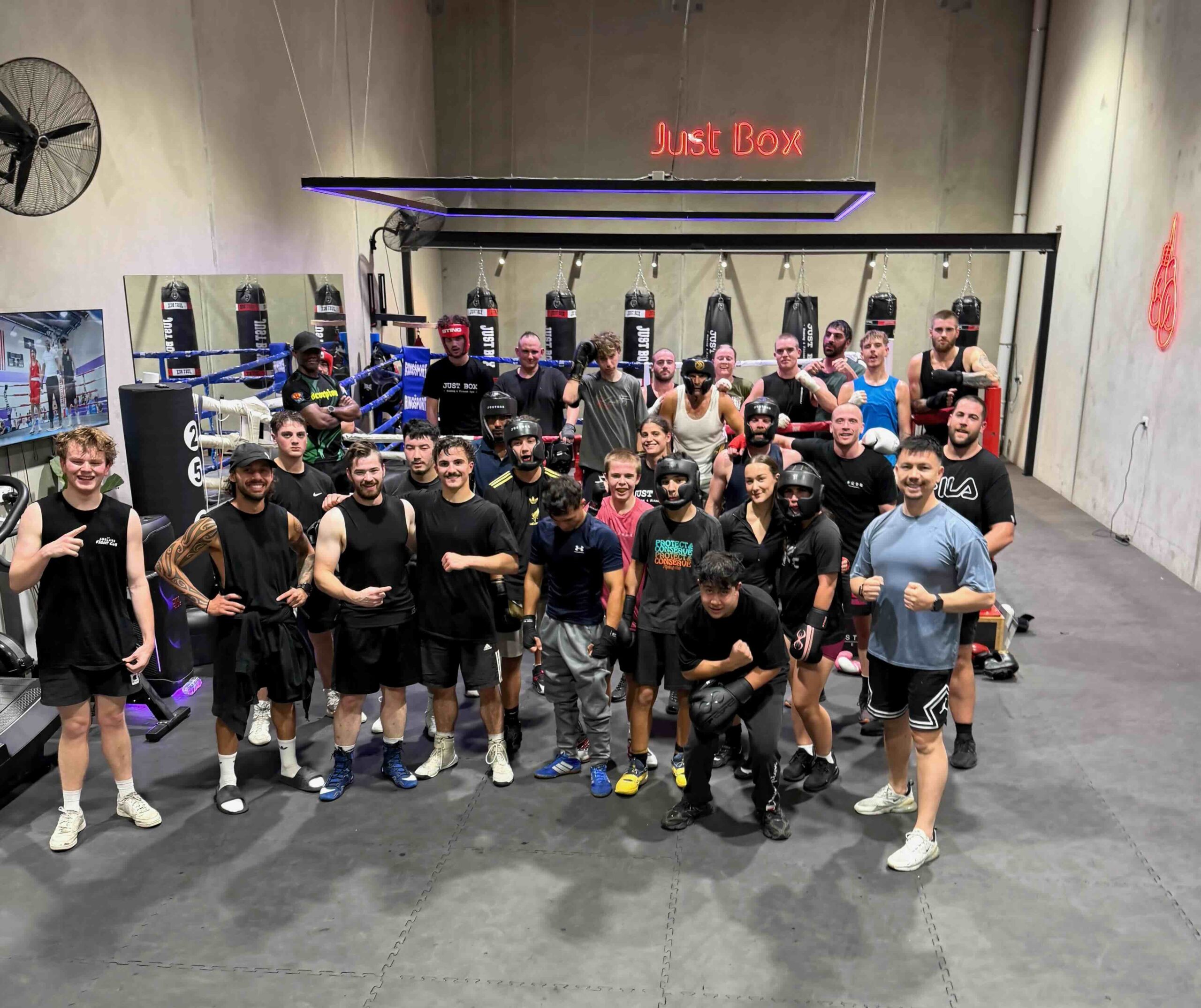 Just Box boxing gym members together at the Kidman Park gym in Adelaide